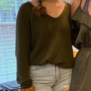 green sweater